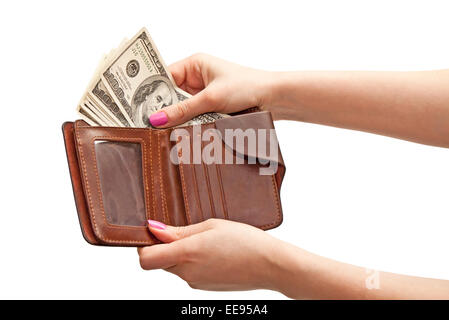 Mano de mujer teniendo 100 dólares del bolso, aislado sobre fondo blanco. Foto de stock