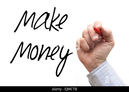 Una foto: Ilustración de una mano escribiendo 'Make Money" Foto de stock