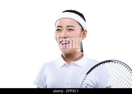 Mujer joven en traje sosteniendo la raqueta de tenis Fotografía de stock -  Alamy