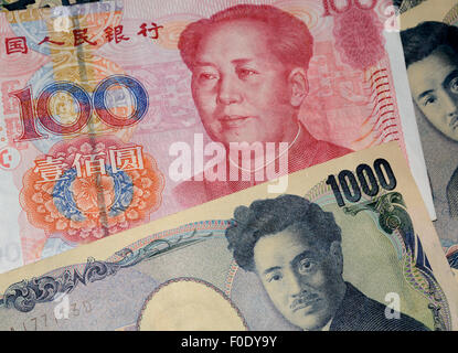 Yuan chino y el yen japonés Foto de stock