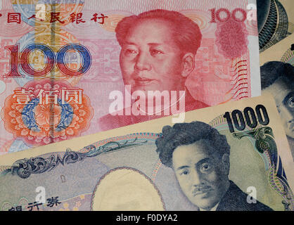 Yuan chino y el yen japonés Foto de stock