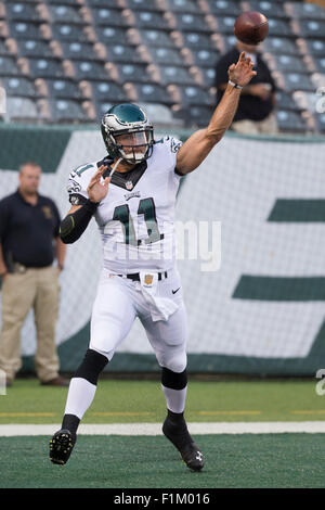 Sep 3, 2015; East Rutherford, NJ, USA; Philadelphia Eagles quarterback Tim  Tebow (11) rushes for yardage against the New York Jets during second half  at MetLife Stadium. (Noah K. Murray/USA Toda …