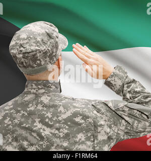 Las fuerzas militares nacionales con bandera en el fondo de la serie conceptual - Kuwait Foto de stock