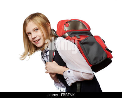 Linda niña de 8 años yendo a la escuela, llevar mochila con ruedas rojo  Fotografía de stock - Alamy