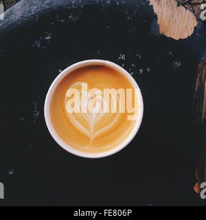 Taza de café capuchino con Latte Design