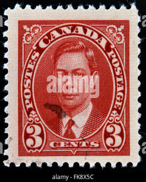 Canadá - circa 1935: un sello impreso en Canadá muestra el retrato del rey Jorge VI, circa 1935