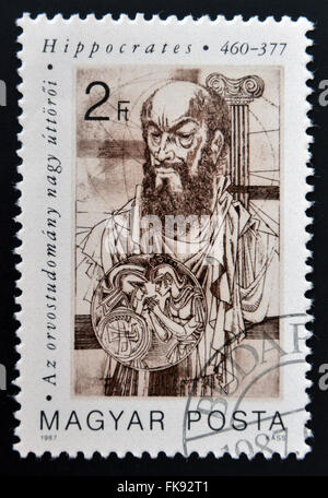 Hungría - circa 1987: sello impreso en Hungría muestra Hipócrates (padre de la medicina), circa 1987 Foto de stock
