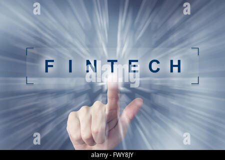 La mano haciendo clic en fintech tecnología financiera o botón con efecto zoom antecedentes Foto de stock