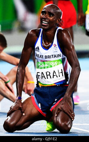 Río de Janeiro, Brasil. 13 Aug, 2016. Mo Farah (GBR) gana la medalla de oro en los hombres de 10.000m en los Juegos Olímpicos de Verano de 2016.Chase Sutton/Duomo/Alamy Live News Foto de stock