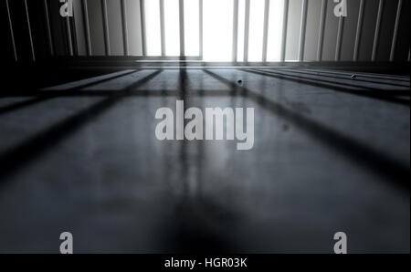 3D Render de un primer plano de vista de celdas barras de hierro con una puerta abierta que proyectan su sombra sobre el piso de la cárcel con espacio de copia Foto de stock