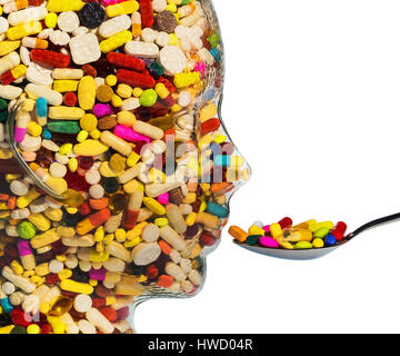 Una cabeza de cristal con muchas tabletas completo. Foto simbólico para las drogas, el abuso y la adicción. tablet, Ein Kopf aus Glas mit vielen Tabletten gefuellt. Símbolo