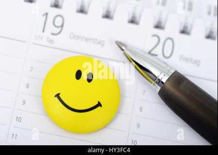 Calendario de citas con Smiley, el éxito de la cita, Terminkalender mit Smiley, erfolgreicher Termin Foto de stock