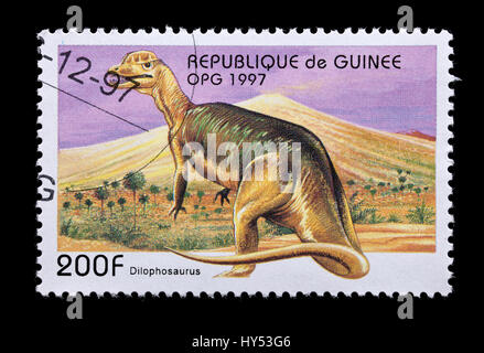 Sello de Guinea representando un dinosaurio dilophosaurus.