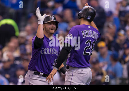 Colorado Rockies third baseman Nolan Arenado hugs his mom, Millie