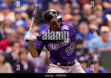 Colorado Rockies third baseman Nolan Arenado hugs his mom, Millie