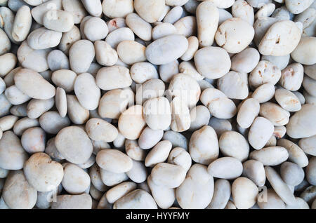 Textura de piedra blanca, muchas piedras blancas en el mar