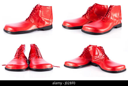 Zapatos de payaso roja sobre un fondo blanco Fotografía de stock - Alamy