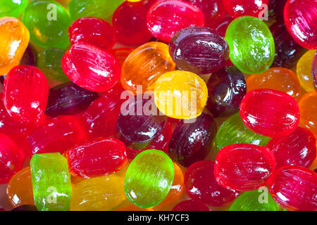 Antecedentes de coloridos dulces de azúcar caramelos dulces color. cerrar