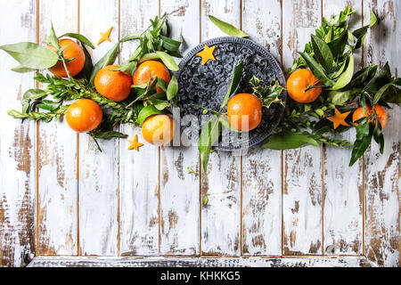 Decoración de la mesa de navidad con las clementinas Foto de stock