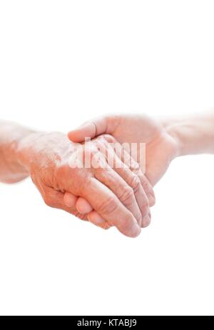 Otra persona sosteniendo la mano cerca. Foto de stock