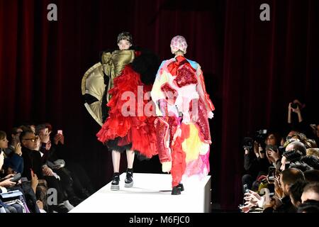 Modelos en la pasarela para el Comme Des Garcons Fashion Show en