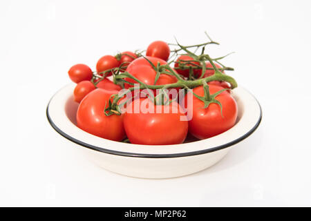 Vid Roja tomates en tazón blanco