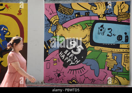 Guiyan, Guiyan, China. El 31 de julio, 2018. Guiyang, China-Varios graffti pueden verse en las paredes de la calle en Guiyang, en el suroeste de la provincia de Guizhou en China. Crédito: SIPA Asia/Zuma alambre/Alamy Live News Foto de stock