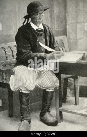 Alcalde la firma de los documentos legales, Bretaña, el norte de Francia. Su traje tradicional incluye pantalon de pliegues y pesados zuecos de madera.