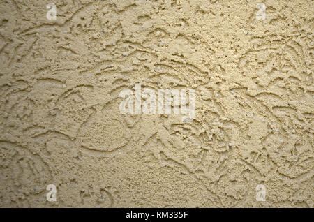 La textura del yeso decorativo beige en corteza escarabajo estilo. Federación de variación de decorar paredes de fachada