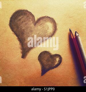 Un simple dibujo a lápiz de dos corazones Foto de stock