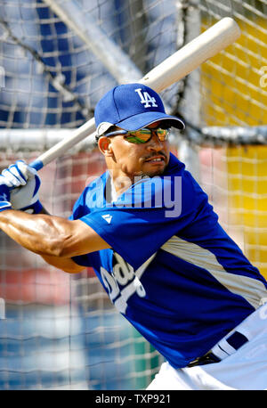 Los Angeles Dodgers shortstop Rafael Furcal, left, and center fielder  Andruw Jones collide as they chas a ball hit for a single by Atlanta  Braves' Brian McCann in the fifth inning of