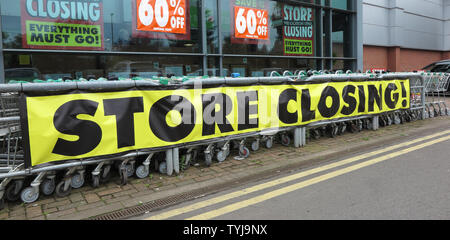 Signo de cierre tienda a base de orígen, Market Drayton, Shropshire Foto de stock