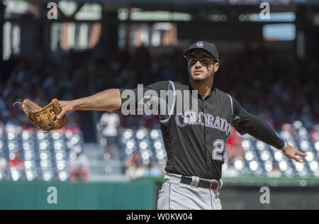 Colorado Rockies third baseman Nolan Arenado hugs his mom, Millie