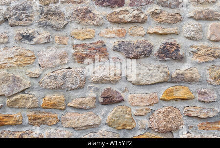 Rectángulo grande piedras en un muro de mampostería, piedra falsa  Fotografía de stock - Alamy