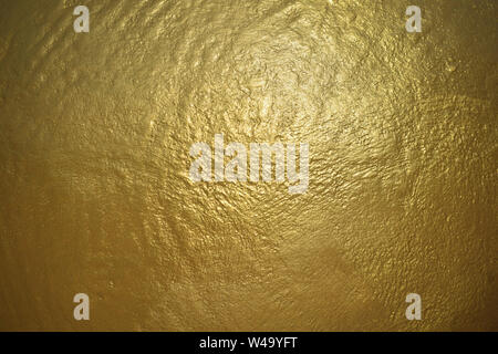 Superficie de textura del fondo de metal dorado de fondo con diseño de lujo Foto de stock