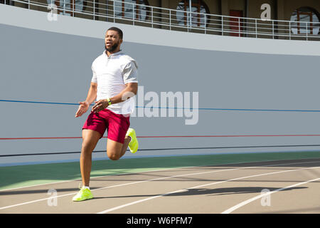Determina grave joven deportista Afroamericano trotar al aire libre Foto de stock