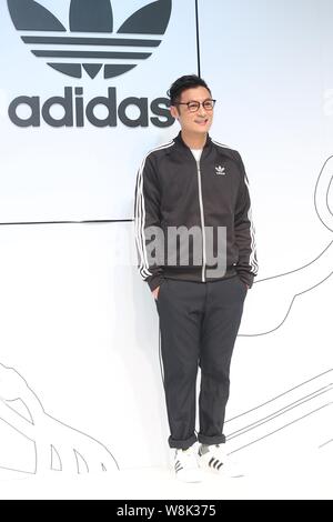 Cantante y actor de Hong Kong Shawn Yue sonríe durante una conferencia de prensa para Adidas sportswear en Taipei, Taiwán, 16 de enero de 2015. Foto de stock