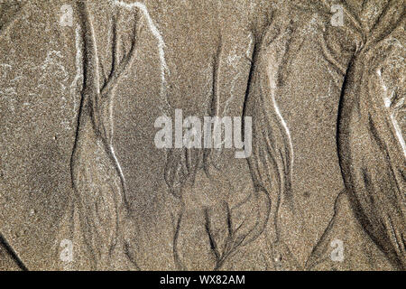 Textura de arena dibujado por ondas Foto de stock