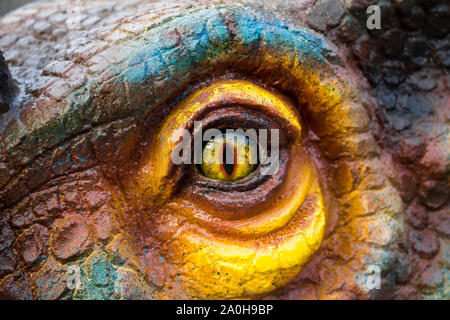 Chasseurs de dinosaures sont horribles avec les yeux jaunes. Banque D'Images