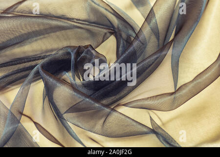 Tissu brillant avec fond beige textile vail Banque D'Images