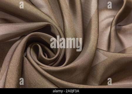 Tissu brillant avec fond beige textile vail Banque D'Images