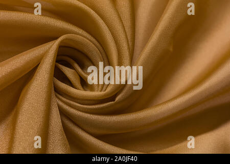 Tissu brillant avec fond beige textile vail Banque D'Images
