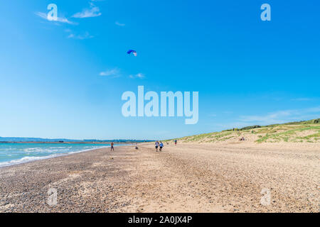 CAMBER SANDS, UK - 15 septembre 2019 : Les gens se détendre sur la plage de Camber Sands dans l'East Sussex, dans le village de Camber. Les 3 miles stretch est l'onl Banque D'Images