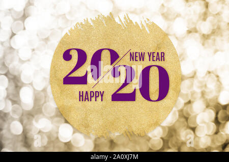 Bonne année 2020 sur word gold circle glitter sparkle gold sur fond flou minime,Maison de vacances Carte de vœux. Banque D'Images