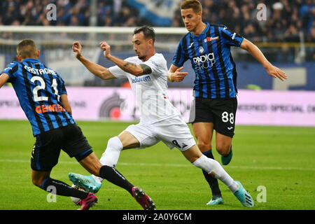 Parma, Italie, 22 Sep 2019, GAETANO CASTROVILLI THIOMOTY ENTRE FIORENTINA CASTAGNE ET MARIO PASALIC ATALANTA Atalanta Vs Fiorentina - au cours de soccer italien Serie A Championnat Hommes - Crédit : LPS/Alessio Tarpini/Alamy Live News Banque D'Images