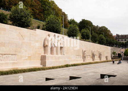 Le mur des Réformateurs le long de la Promenade des Bastions à Genève, Suisse, un monument de sculptures honorant les fondateurs du protestantisme. Banque D'Images