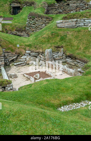 Skara Brae, un village néolithique en pierre situé sur la baie de Skaill sur la côte ouest de l'îles Orcades en Ecosse. Banque D'Images