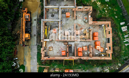 Site de construction d'un bâtiment résidentiel haut vue depuis le bourdon Banque D'Images