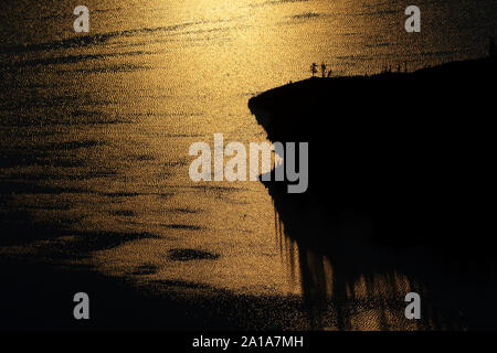 L'île de silhouette assistant jardinier donnent sur, Crater Lake National Park, héritage Volcano National Scenic Byway, Oregon Banque D'Images