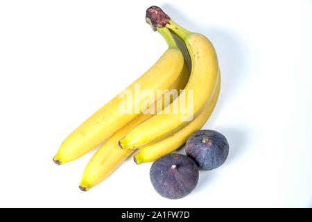 Figues et bananes, de beaux fruits, bananes, figues violettes, close-up, les vitamines concept, végétaliens, une saine alimentation, Banque D'Images